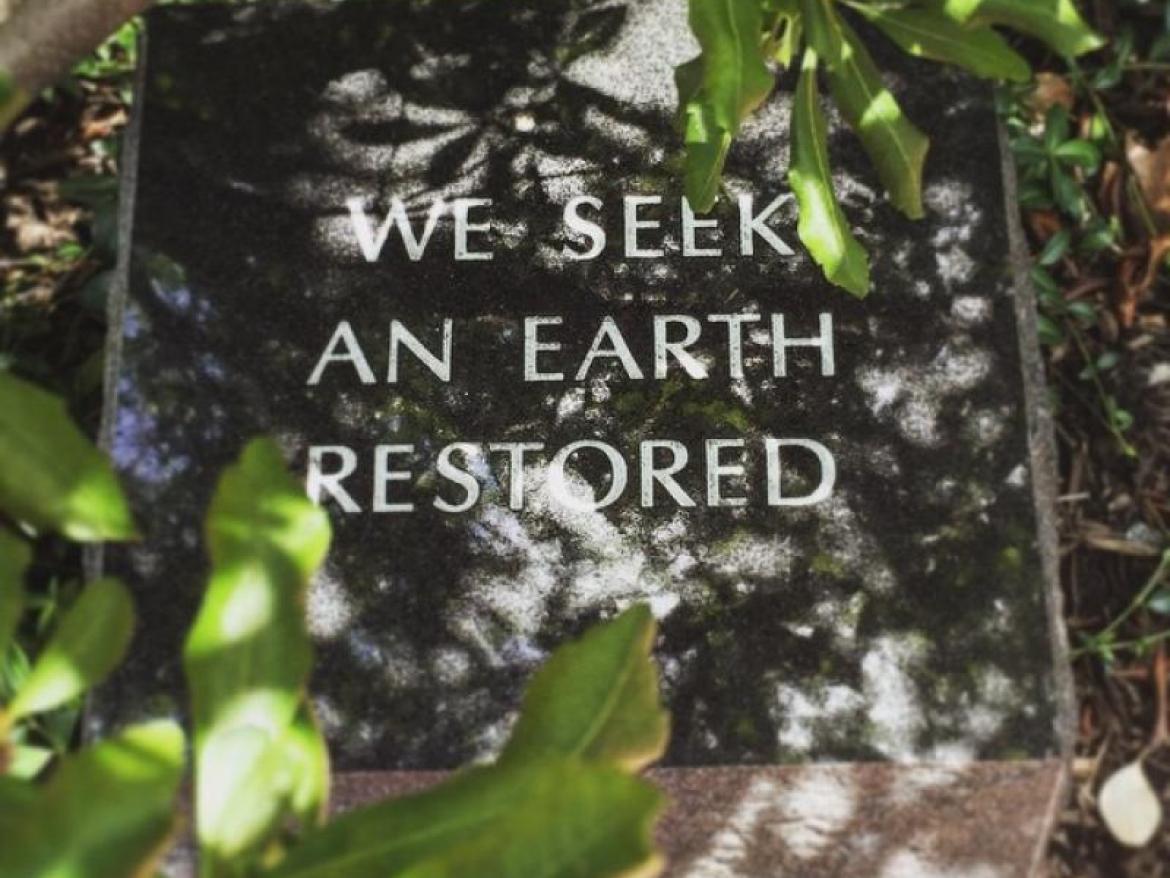 Plaque Saying We Seek an Earth Restored