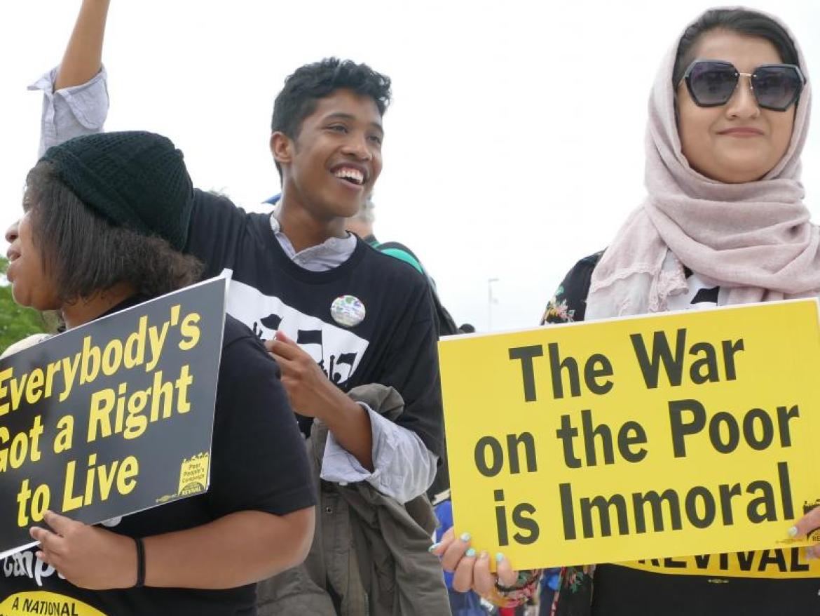 People with signs from Poor People's Campaign