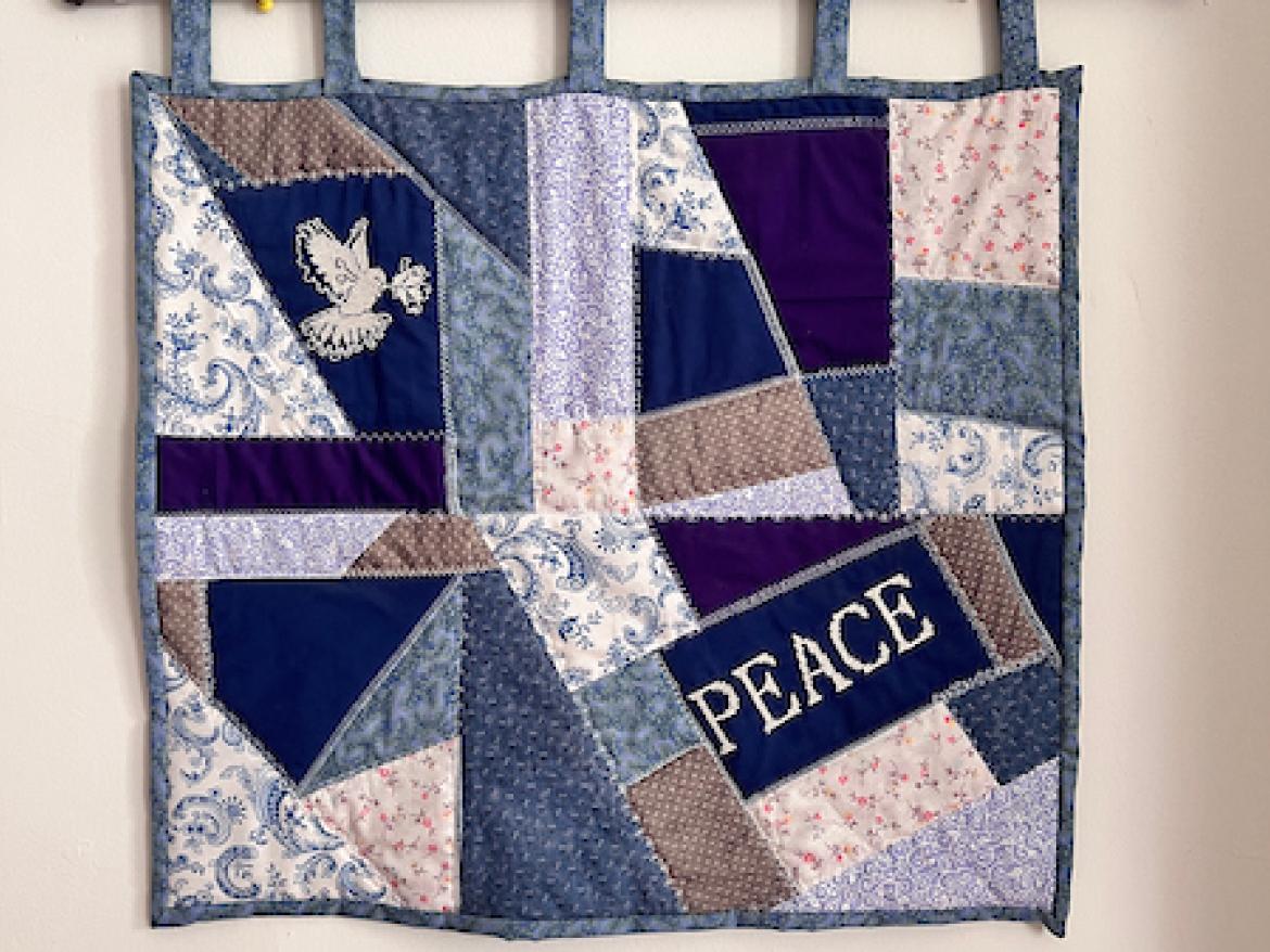 Quilt with the word peace