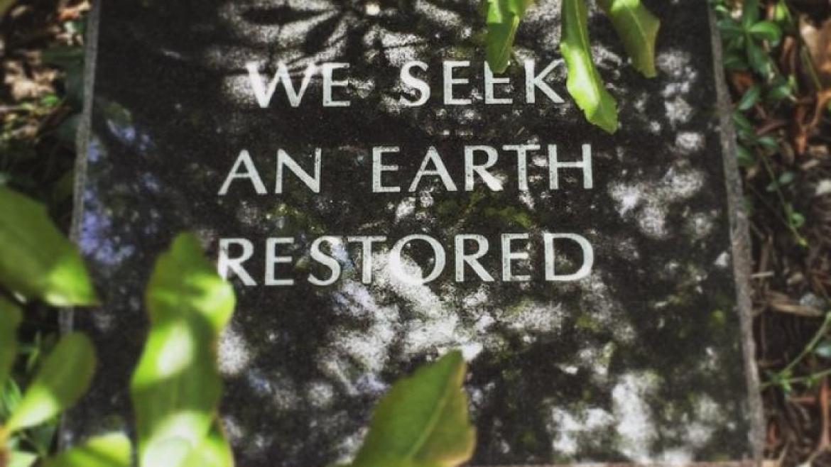 Plaque Saying We Seek an Earth Restored